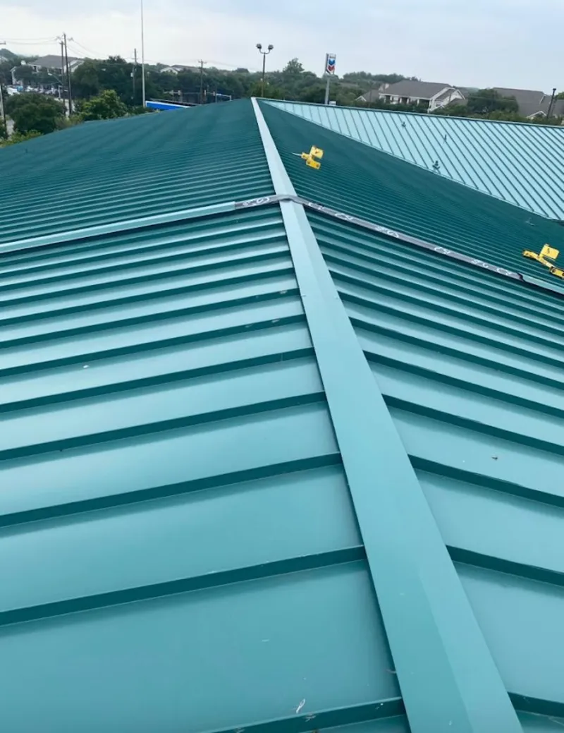 Green commercial metal roof ridge and valley for Metal Roof Repair in Hamilton